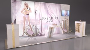 display stand with large graphic, chairs, tv and perfume bottles
