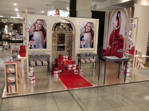 front of display stand with Julia Roberts image and xmas gifts